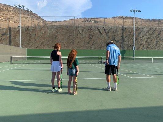 Coach Paul starting us off with how to hold the racquet.