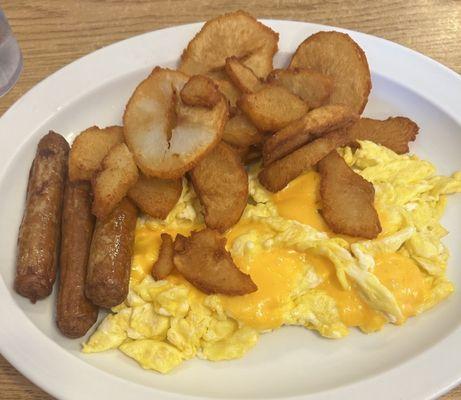 Eggs Any Style (Three Eggs) - scrambled eggs with cheese, turkey sausage, and home fries cooked with well done