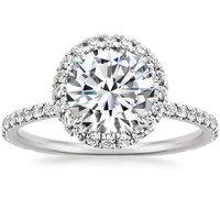 Round Brilliant Cut Diamond halo ring with diamond accents on the shank.