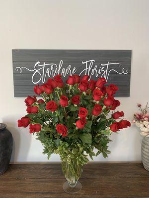 Beautiful Long stem red roses. 60 total in this design.