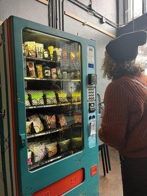 A sweet vending machine with some fun kitschy stuff