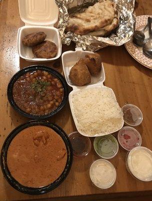 Chicken Tikka Masala, Chana Masala, Aloo Tikiyas, free Samosas w a $30 order! Soooo good, will definitely be ordering again!