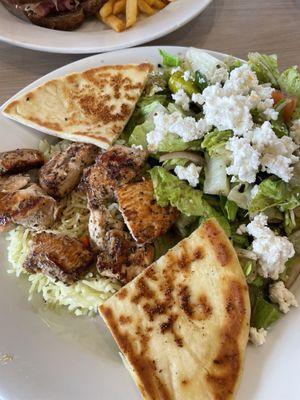 Chicken slovaki, rice pilaf and a "Greek salad"