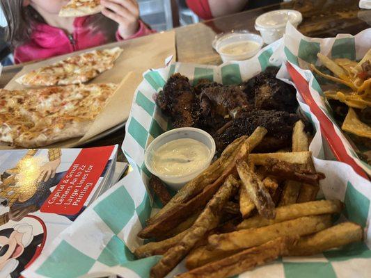 Blueberry bbq wings with fries and a 10" cheese pizza.