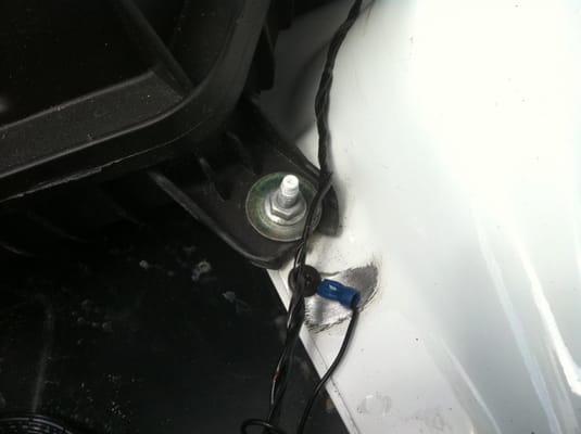 They scratched my 4 day old car to ground a wire when all they had to do was connect it to the electrical box per video