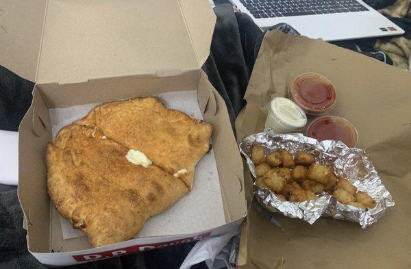 Pepperoni calzone & tots box. Get their ranch sauce on the side- it was amazing for dipping!