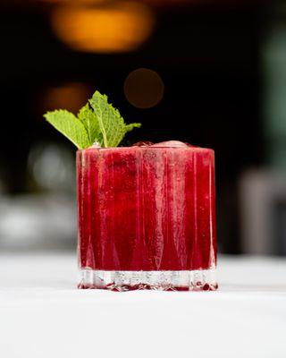 SPICY BLACKBERRY MARGARITA tequila, orange liqueur, blackberry purée, habañero-lime syrup.