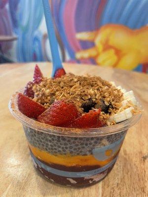 Açaí Bowl, gold açaí, blue chia, hemp granola, bananas, strawberries, & blue berries! Delicious