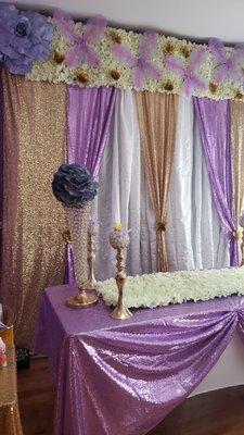 Purple and gold baby shower with butterfly floral design