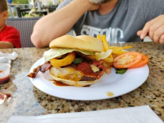 western burger with bacon, cheese, jalapenos, onion rings and BBQ sauce.