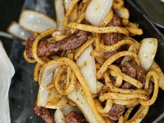 Black pepper beef tenderloin udon noodles.