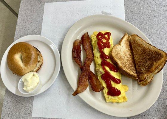 Bagel, bacon, omelette, and toast