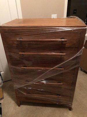 Mid Century 5-drawer dresser only wrapped in plastic. We provided moving blankets and they didn't use all of them. Why??