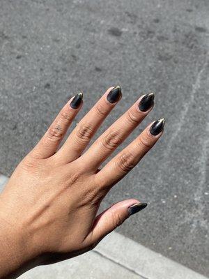 matte black gel nails (natural) with gold tip detail