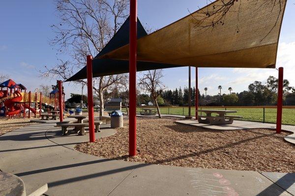 Shades over the picnic tables. Enjoy your lunch in this beautiful park!