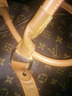 Handle to my Louis Vuitton duffle bag that he repaired.