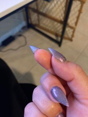 Absolutely no shape to the bottom of this nail he had to replace because he shaped it crooked to begin with.