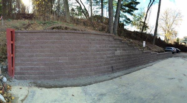 Keystone retaining wall installation by Butler Landscaping and Construction almost complete.