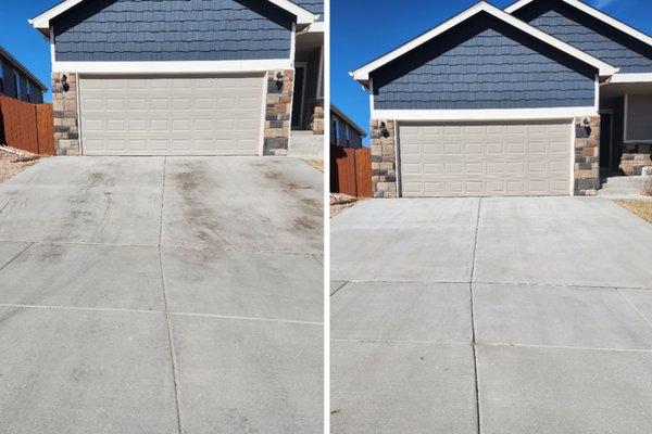 Power washing a residential driveway in Colorado Springs