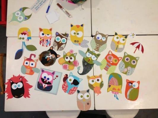 Making paper owls at the August Artist Reception with Feed the Fish co.