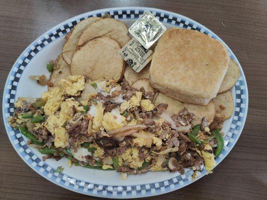 Philly scrambler with home fries and biscuit