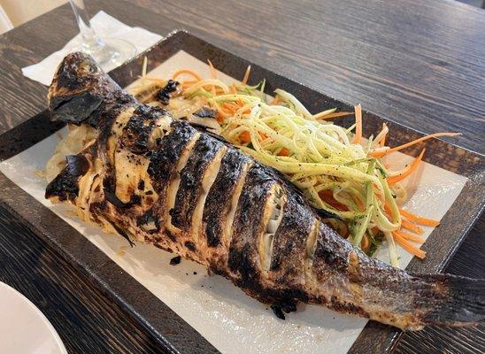 Grilled whole sea bass