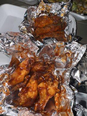 Bbq wings and lemon pepper with hot sauce