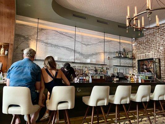 Bar with leather bar stools