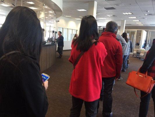 Long line ~noon time on Frid & only one teller ( in training) behind the counter. It's absurd !!!