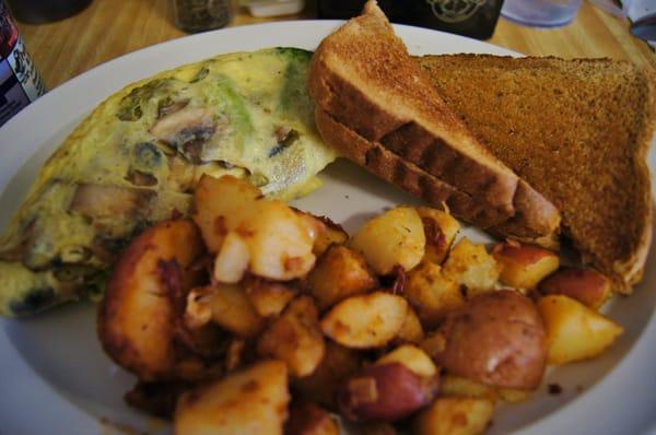 Brocolli, Asparagus, Mushroom, and goat cheese omlete.  Very yummy with home fries and toast!