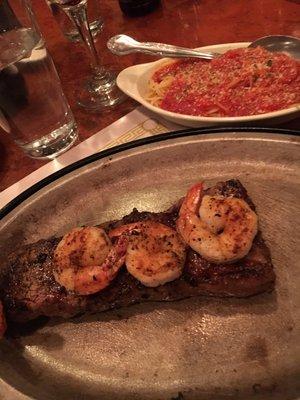 Valentine's special of small strip & four shrimp, with spaghetti as a side.