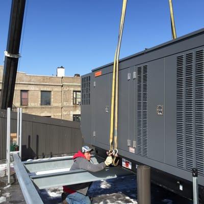 Building Conversion - Bronx, NY Installation of 750KW building generator on the roof for power and fire alarm systems