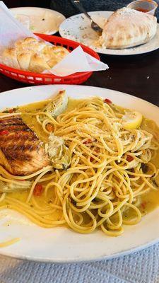 This grilled salmon Over Linguini in a lemon brown sauce is the best