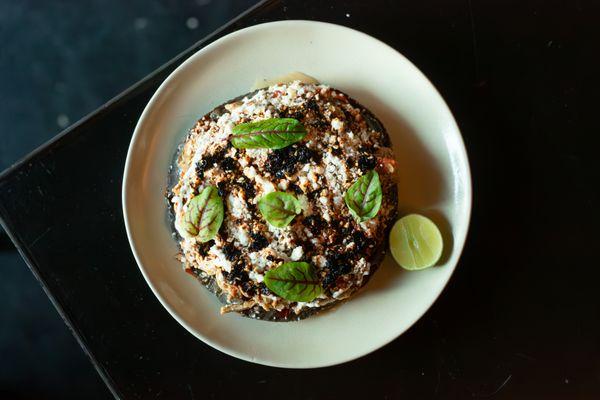 Chicken Tinga Tostada
-
refried lentils with bacon, jocoque, tomatillo