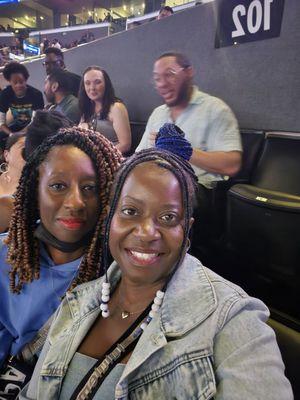 Sister and I. Hair done by Miko. Sister has crochet twists and I have blue cornrows with undercut.