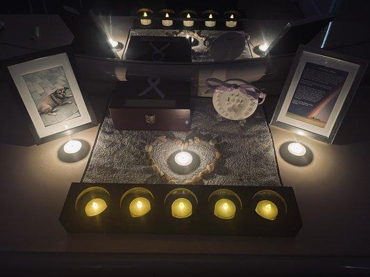 The beautiful mahogany wood urn as well as the clay paw print, and the emotionally touching "Rainbow Bridge" poem.