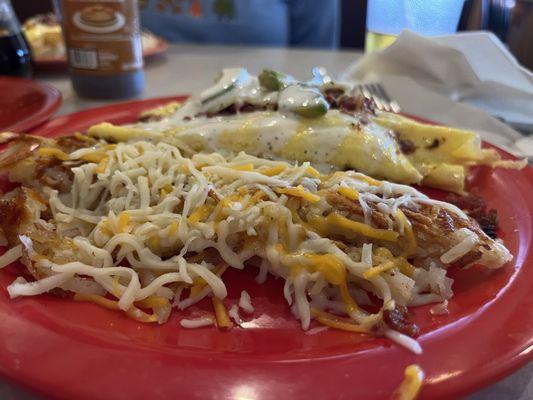 Bacon avocado ranch omelette, hash browns with cheese