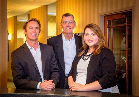 All Three Remmers Dental Dentist: Dr. Stephen Remmers, Dr. Kenneth Remmers, & Dr. Emily Brown.