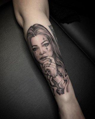 Black and grey portrait by Rest.