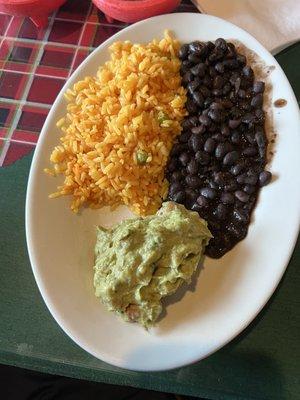 Rice, beans and guac sides w/meal.