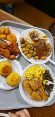 chicken fried steak and chicken strips with all the fixins