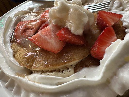 Pancakes with strawberry and whipped cream