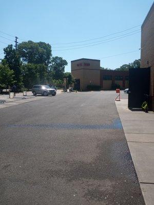 Getting a car handwash and vacuum.