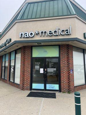 Nao Medical - Hicksville Urgent Care entrance, modern building, accessible healthcare.