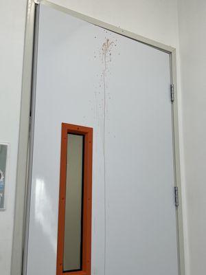 Blood on the door of the room