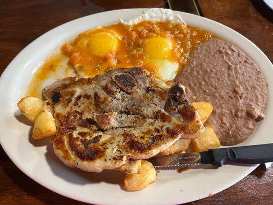 Pork chop and egg breakfast