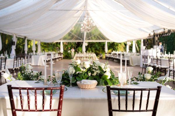 The tent is beautiful! A lot of people add more flowers and other decor, but it's lovely as-is.