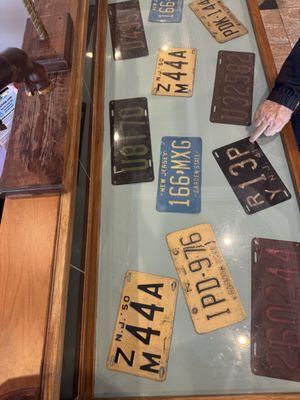 Old Jersey license plates in a display case