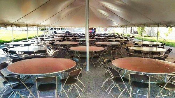 40 wide pole tent. 72" round tables. Brown chairs