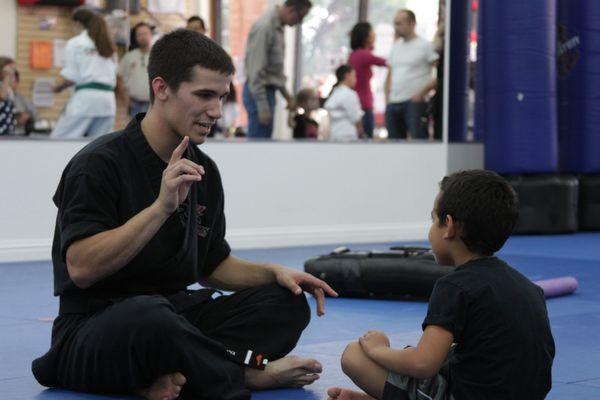 Sifu Joseph helping a new student